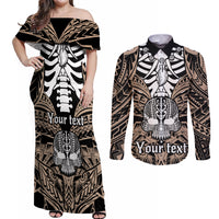 personalised-polynesia-skull-couples-matching-off-shoulder-maxi-dress-and-long-sleeve-button-shirts-with-boars-tusk-gold-arty-vibe