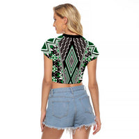 Green Aotearoa Tukutuku and Poutama Motif Raglan Cropped T Shirt