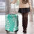Puakenikeni and Maile Lei Luggage Cover Sage Green Double Strand Lei