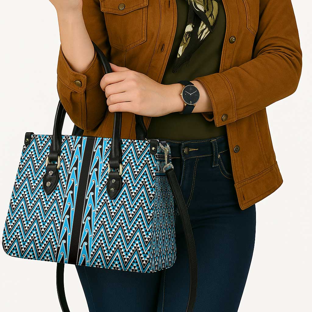 New Zealand Maori Niho Taniwha Leather Bag Kikorangi Mangopare and Puhoro Pattern - Polynesian Pride