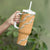 Aloha Pakalana and Puakenikeni Lei Tumbler With Handle Gold Hawaiian Pattern